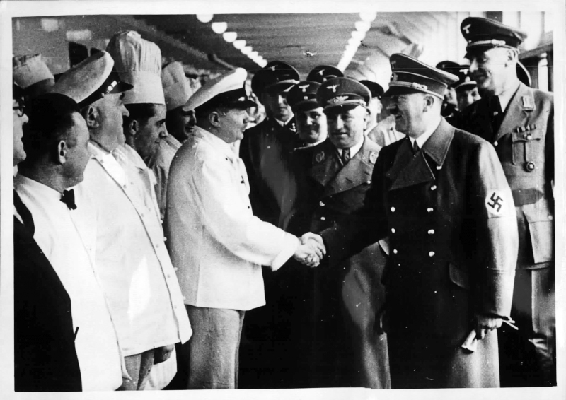 Adolf Hitler on board the Robert Ley KdF (Kraft durch Freude) ship greets crew members